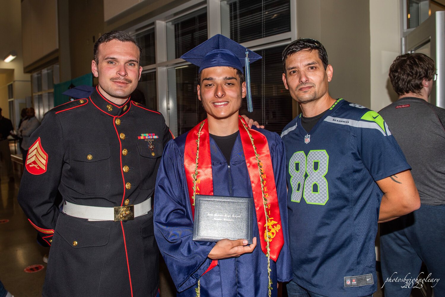 A New Market High School graduate with his family.